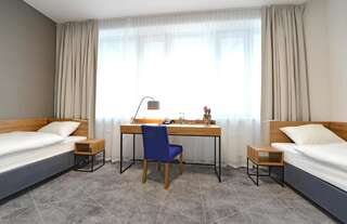Отель Hotel Centrum Болеславец Двухместный номер с 2 отдельными кроватями - Подходит для гостей с ограниченными физическими возможностями-2