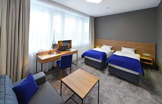 Отель Hotel Centrum Болеславец Большой двухместный номер с 1 кроватью или 2 отдельными кроватями-2